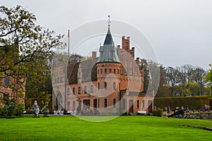 Egeskov, Denmark, Europe: Egeskov castle slot landmark fairy tale castle in Funen Denmark view from the garden