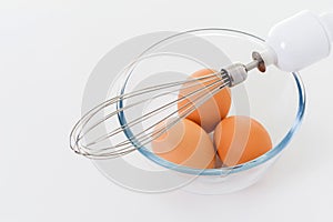 Egg beater with eggs