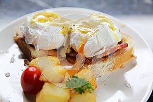 Egg benedict , poached eggs with toast , English Breakfast