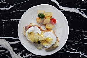 Egg benedict , poached eggs with toast , English Breakfast