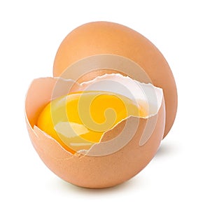 Egg broken in half isolated on white background