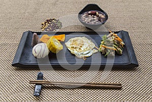 Egg cake, roughage steamed bread and side dishes breakfast set meal