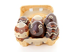 Egg carton with decorated easter eggs