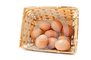 Egg collection in the basket isolated on white