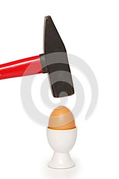 Egg cracking with hammer