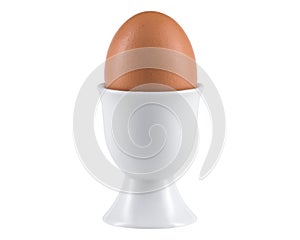 Egg in Egg cup. Ceramic eggcup for breakfast. Holder stand for boiled or raw chicken eggs on white isolated background.