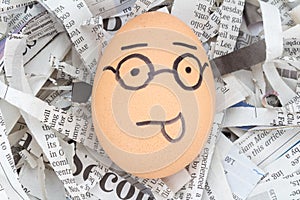 egg face glasses on newspapers recycle