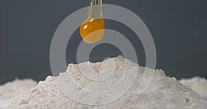 Egg Falling on Flour