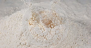 Egg Falling on Flour