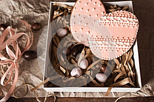 Egg form sweets in gift box close up