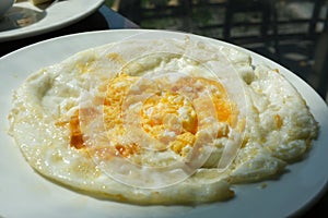 the egg is fried on both sides two sunny side up eggs ready to serve for breakfast photo