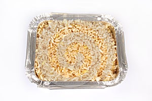 Egg fried rice against a white background from a Chinese takeaway.