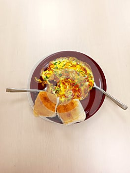 Egg full fry with vegetables