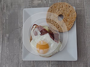 Egg, ham and avocado bagel