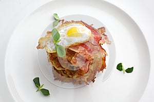 Egg,ham for breakfast in white plate