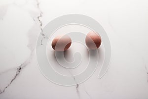 Egg on marble table as minimalistic food flat lay, top view food brand photography flatlay and recipe inspiration for cooking blog