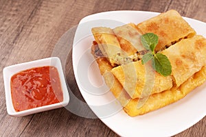 Egg murtabak or martabak Jawa vegetables stuffed pancake