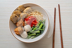 Egg noodles with fish balls and shrimp balls in pink sauce, Yen Ta Four or Yen Ta Fo