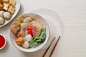 Egg noodles with fish balls and shrimp balls in pink sauce, Yen Ta Four or Yen Ta Fo