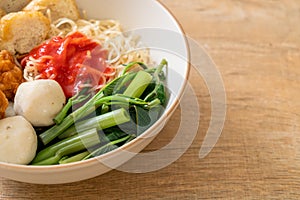 Egg noodles with fish balls and shrimp balls in pink sauce, Yen Ta Four or Yen Ta Fo