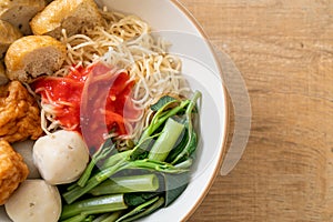 Egg noodles with fish balls and shrimp balls in pink sauce, Yen Ta Four or Yen Ta Fo