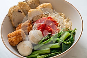 Egg noodles with fish balls and shrimp balls in pink sauce, Yen Ta Four or Yen Ta Fo