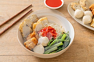 Egg noodles with fish balls and shrimp balls in pink sauce, Yen Ta Four or Yen Ta Fo