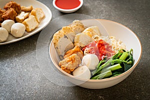 Egg noodles with fish balls and shrimp balls in pink sauce, Yen Ta Four or Yen Ta Fo