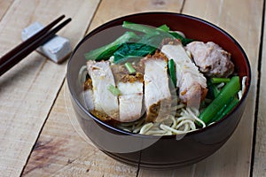 Egg noodles with vegetables and crispy pork ,selection focus