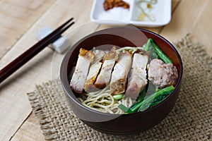 Egg noodles with vegetables and crispy pork ,selection focus