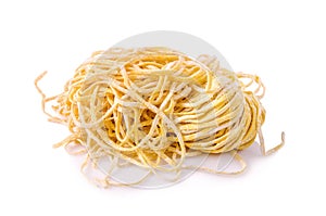 Egg noodles on a white background