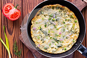 Egg omelet in a pan