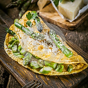 Egg Omelette Garnished with Asparagus and Cheese