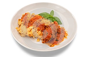 Egg pasta tagliatelle with tomato sauce and beef meat roll photo