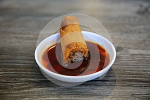 Egg roll. chinese Egg Roll with Plumb Sauce. Fried chinese egg roll appetize. A delicious serving of egg rolls filled with chicken