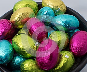 Egg shaped chocolate in a bowl