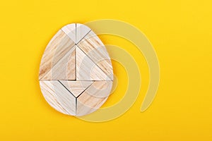 Egg-shaped tangram puzzle built from tangram pieces