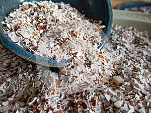 Egg shells crushed in bowl and plate