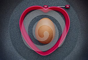 Egg into a silicon form ready to cook