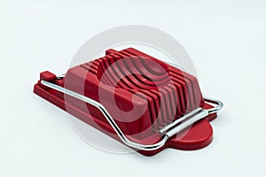 Egg slicer tool isolated on white background