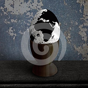 Egg on a stand on the table.