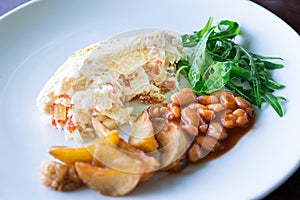 Egg white omelette omelet with beans potatoes and salad, healthy breakfast