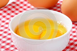 Egg whites and yolks in bowl