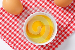 Egg whites and yolks in bowl