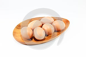 Egg wooden fork, wooden spoon on white background