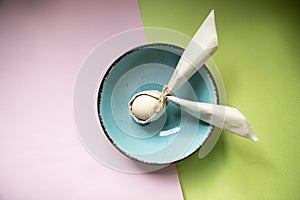 egg wrapped in easter bunny shaped napkin