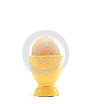 Egg in yellow eggcup