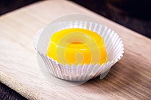 Egg yolk candy with sugar, typical of Brazil and Portugal, called Quindim or Brisa de Liz photo