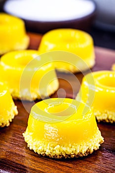 Egg yolk candy with sugar, typical of Brazil and Portugal, called Quindim or Brisa de Liz photo