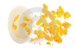 Egg yolk crumbled isolated on white background. Top view. Flat lay